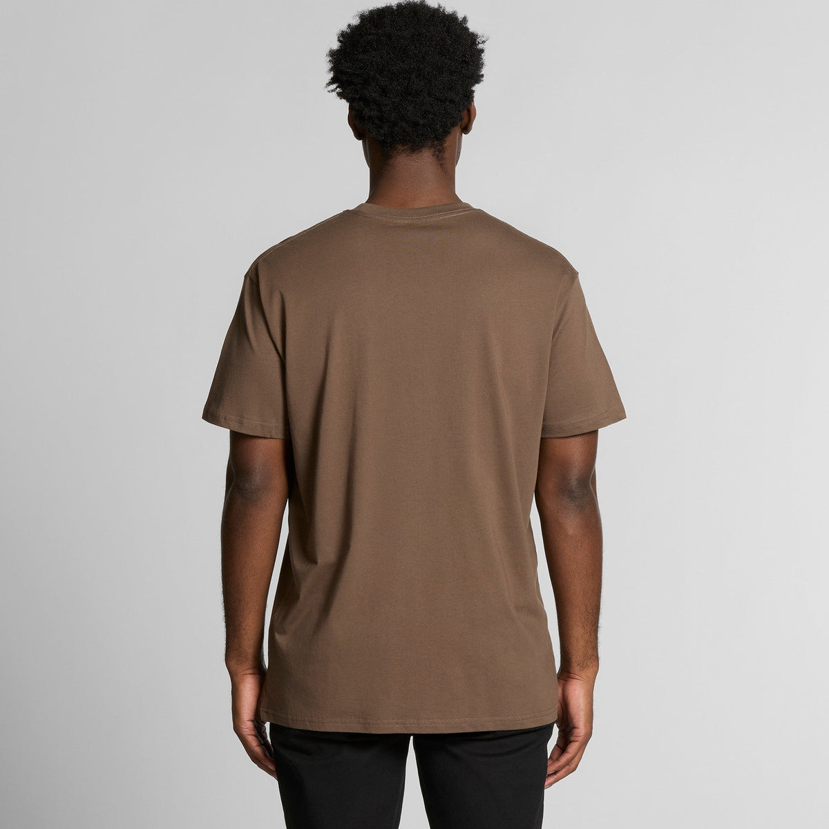 Brown t-shirt with pocket and short sleeves.