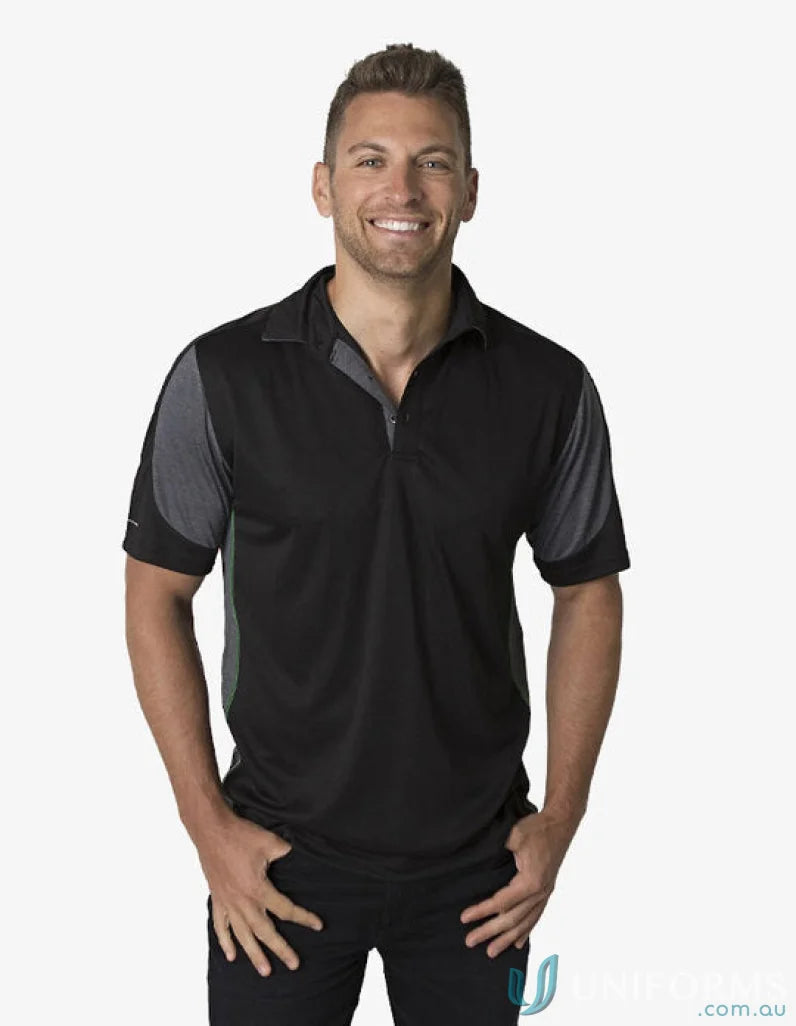 Man in Black Kanvas Contrast Polo showcasing aegis microbe shield and cooldry moisture management