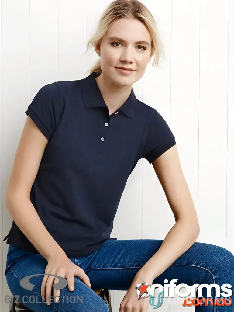 Navy blue polo shirt with white button placket from CR EMb Ladies Polo for work environments