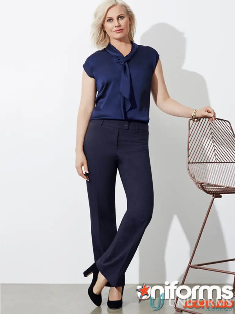 Woman wearing navy blue straight leg workwear pants from CR Ladies Relaxed Fit line