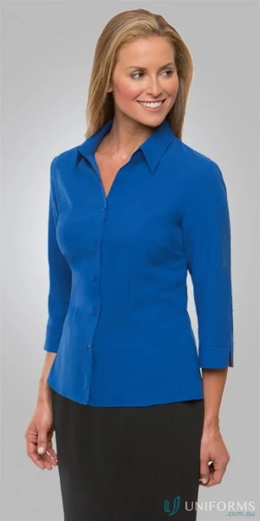 Woman in a blue Ezylin Ladies 3Qtr Shirt with shaped hem and open neckline