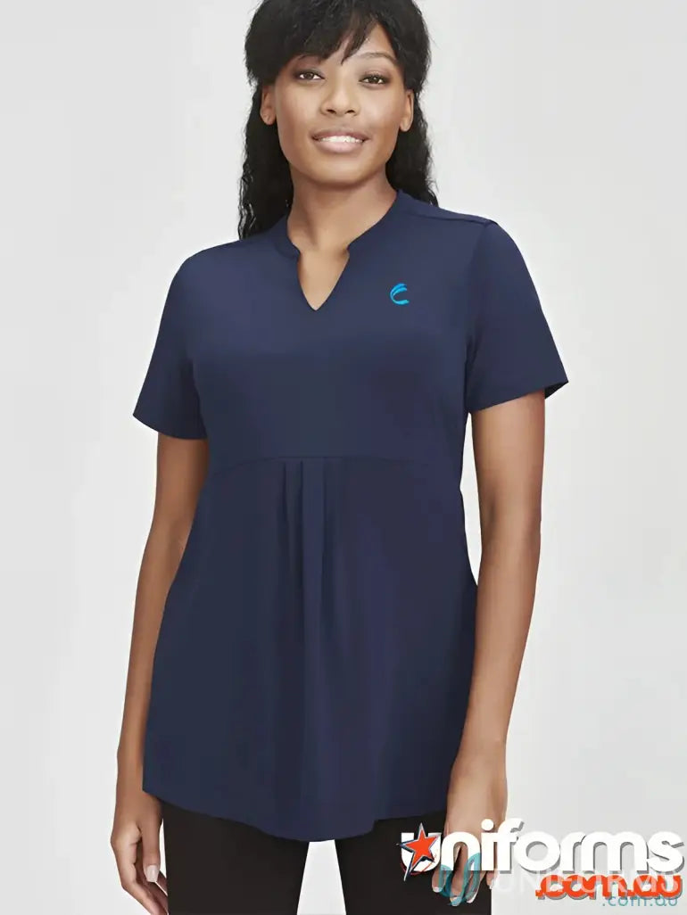Woman wearing dark blue IOP EMB Ladies Easy Fit Top, perfect for uniforms and workwear