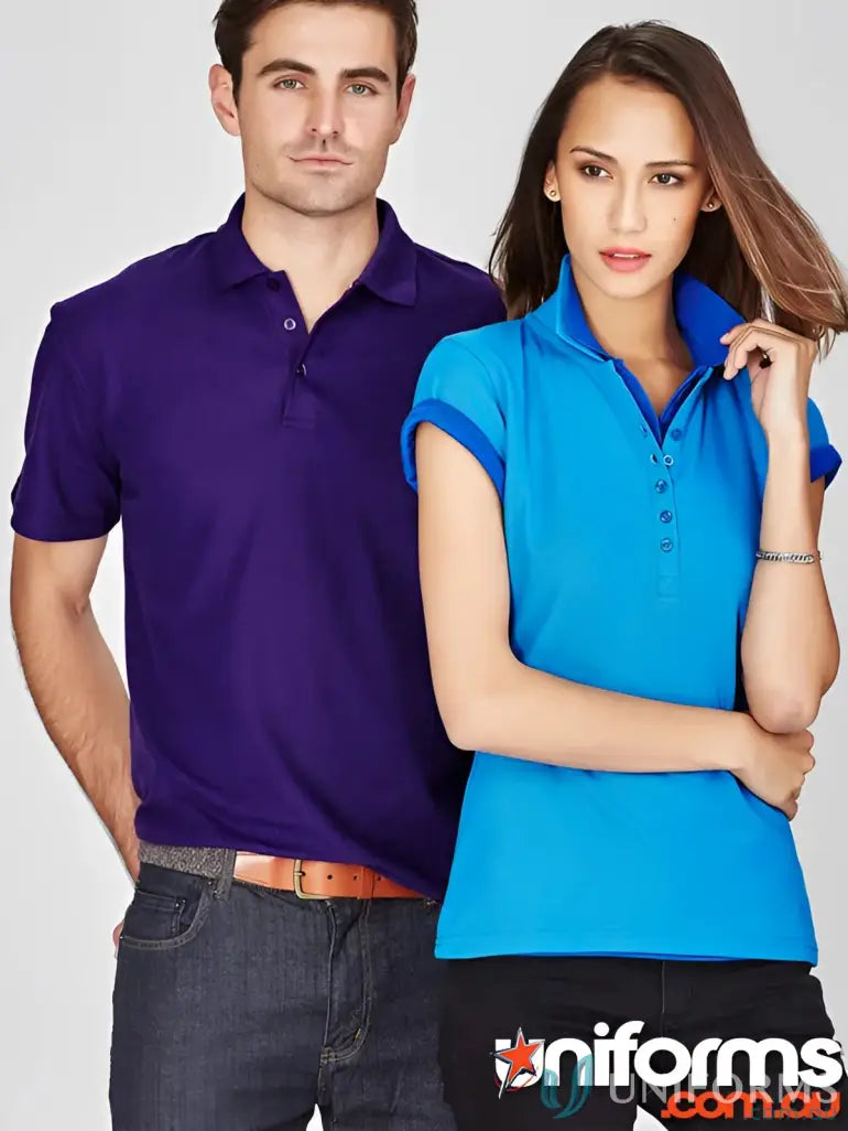 Two people wearing Krue Polo short sleeve polos with durable top-stitched armholes