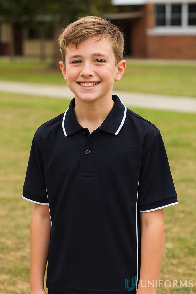 Young boy in JBs Kids Podium Piping Polo made with Podium Cool fabric