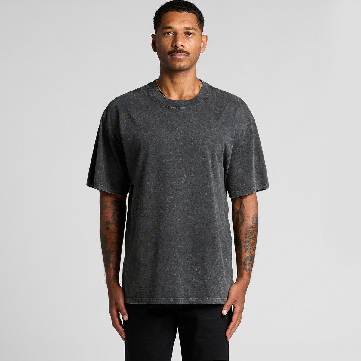 Charcoal gray oversized t-shirt with speckled texture and crew neck.