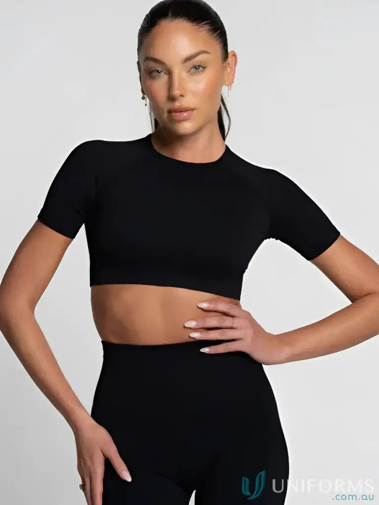 Black seamless cropped onyx tee with high neckline and stretchy fabric perfect for stylish work uniforms and workwear