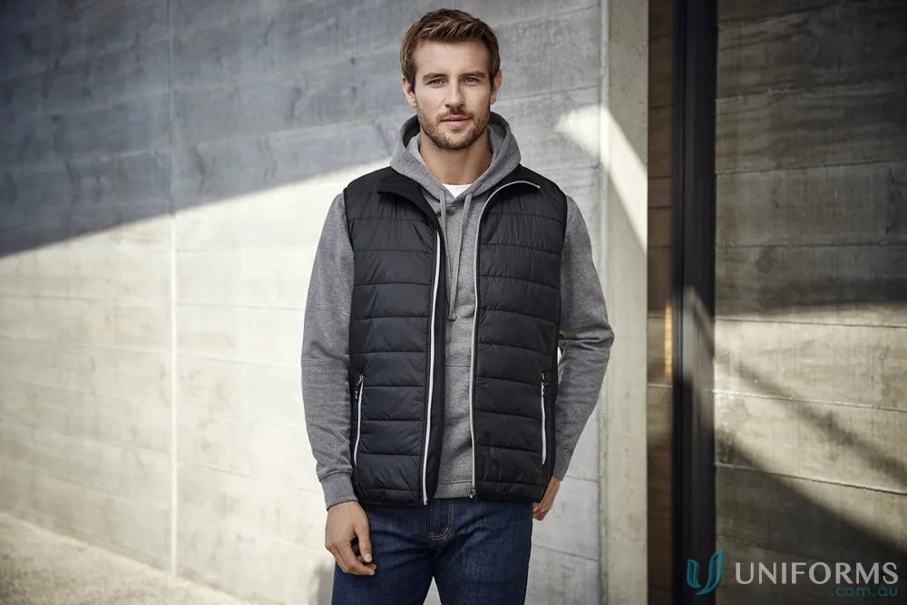 Man wearing a black mens stealth vest from Stealth Vest collection with core warm polyfil insulation