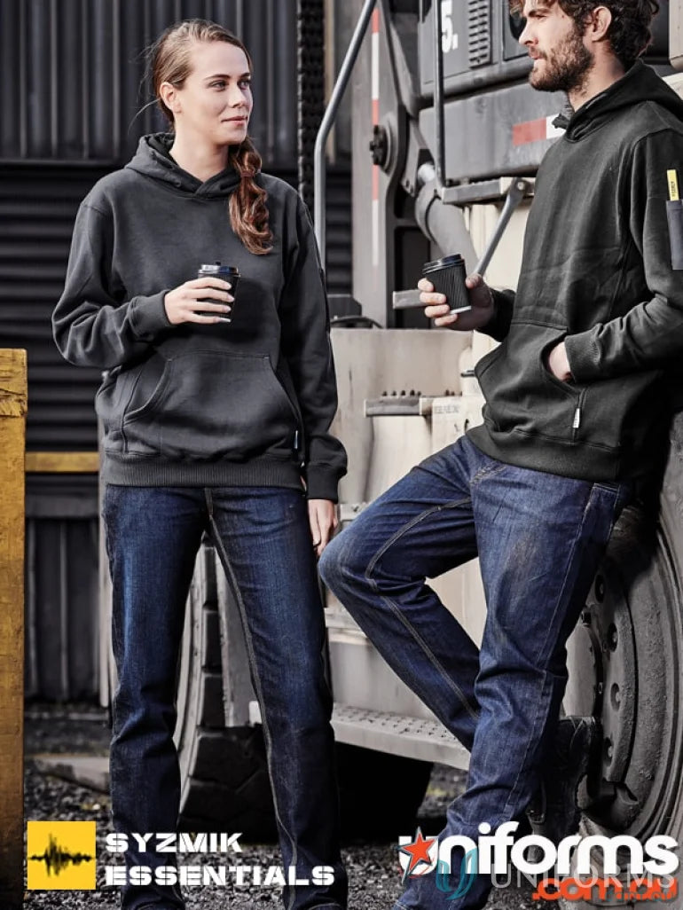 Two women in dark hoodies and jeans wearing Syzmik Womens Stretch Denim Work Jeans ZP707