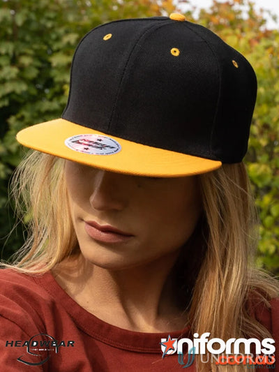 Black and yellow baseball cap from American Twill Snapback, perfect for work uniforms