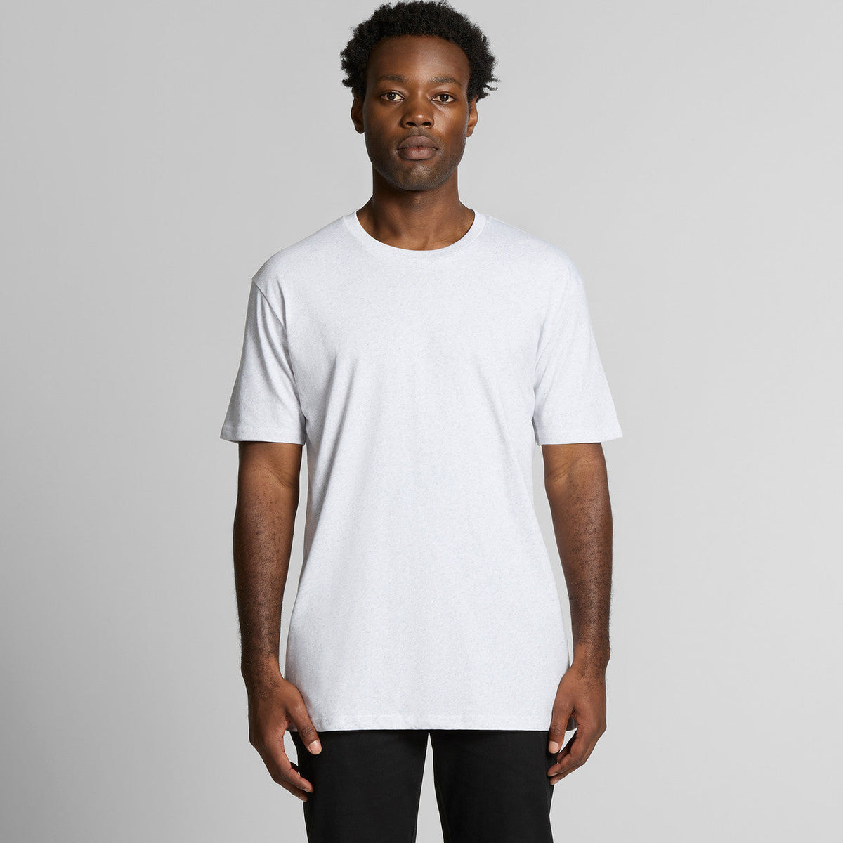 White crew neck t-shirt with short sleeves and a relaxed fit.
