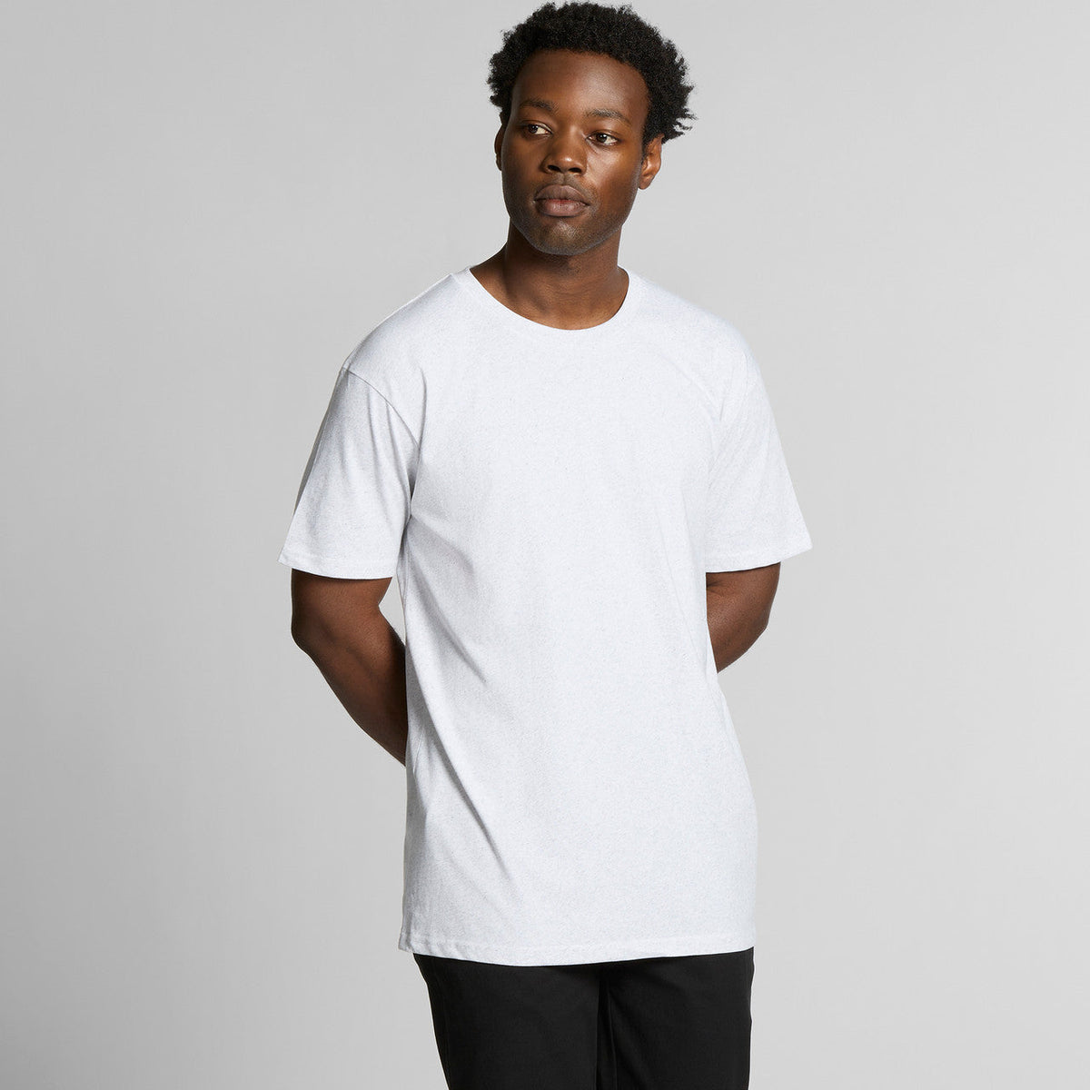 White crew neck t-shirt with short sleeves and a relaxed fit.