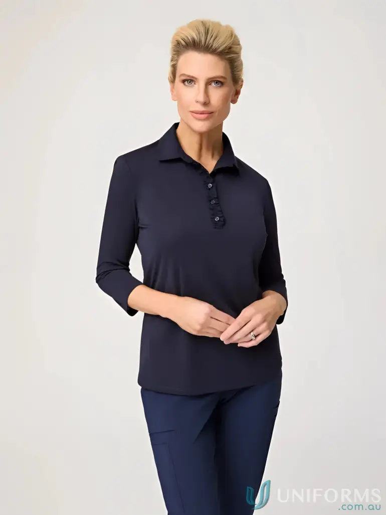 Woman wearing Bella 3q Frill Placket Top with sleeve frill placket in breathable polyester matte