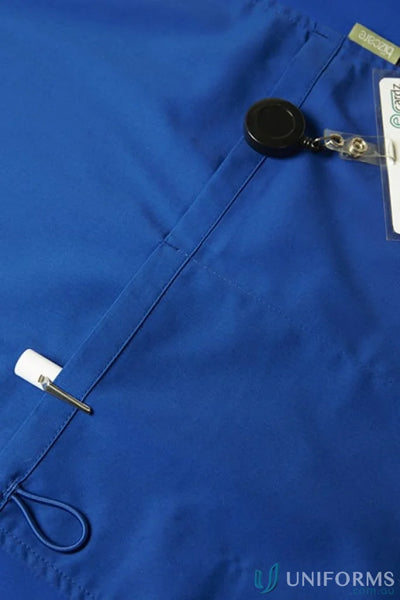 Blue Biz Riley V-Neck Scrub Top with pocket featuring stretch panels and riley stretch scrub tech