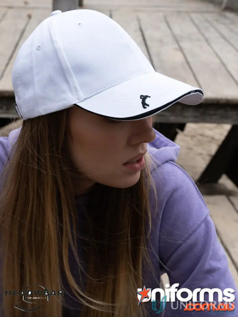 White baseball cap with black trim from Chino Twill with Golf Peak, high imprint style