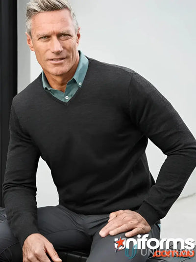 Man wearing dark V-neck sweater from WP916M Biz Collection Roma Knit with relaxed ribbed cuffs