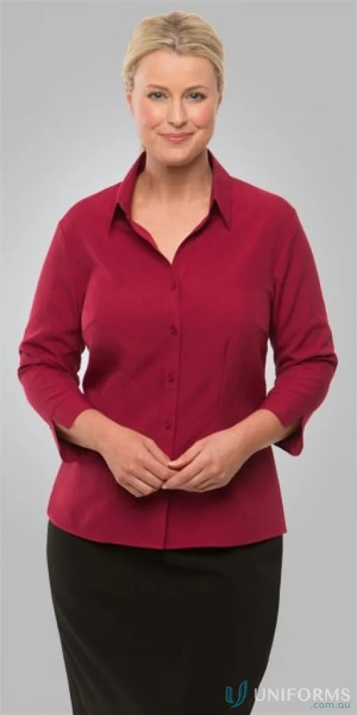 Woman in Ezylin Ladies 3qtr Shirt with shaped hem and open neckline for work uniforms