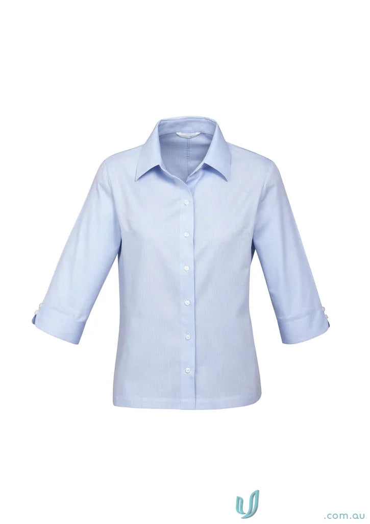 Light blue women’s collared shirt with mini herringbone pattern for work environments