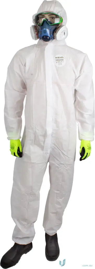 Person in Heatguard Fire Resistant Coveralls wearing workwear with respirator and goggles