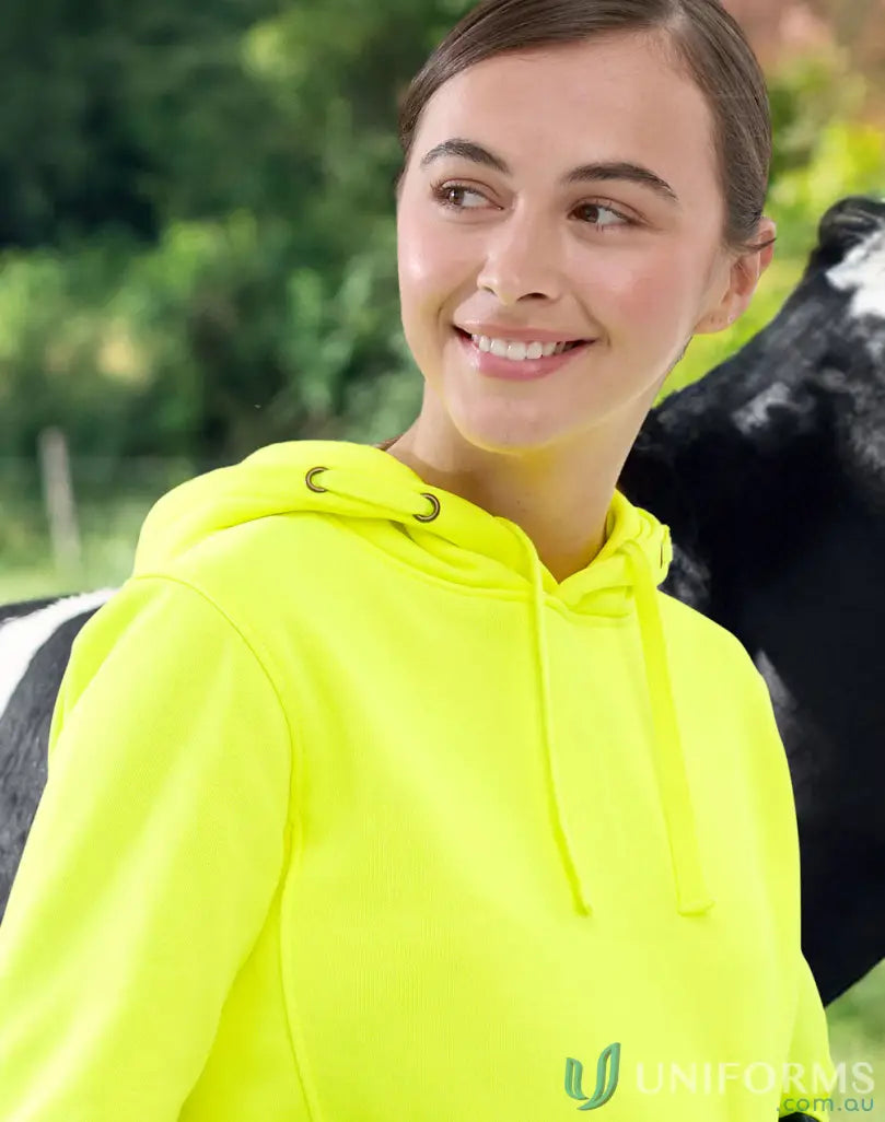 Smiling young woman in neon yellow HiVis Water Resistant Fleece Hoodie SW91