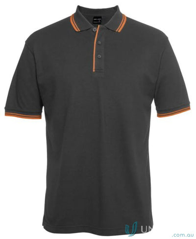 Gray kids contrast polo shirt with orange trim and reinforced herringbone tape from JB’s Kids Contrast