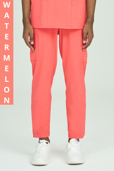 Joey Scrub Pant in watermelon color with elastic bungee loop and secure zip