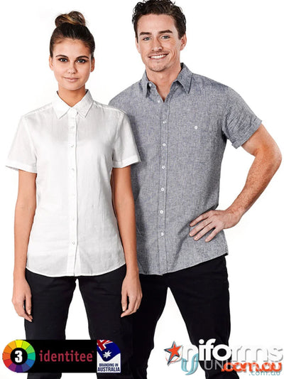 Two women wearing ladies Floyd short sleeve linen cotton shirt and black pants