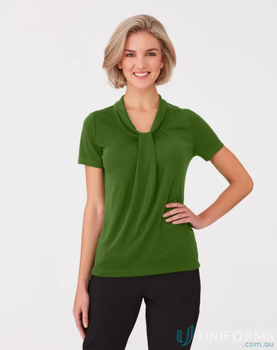Woman in green Pippa Ladies SS Top with soft draped neckline and comfy fit