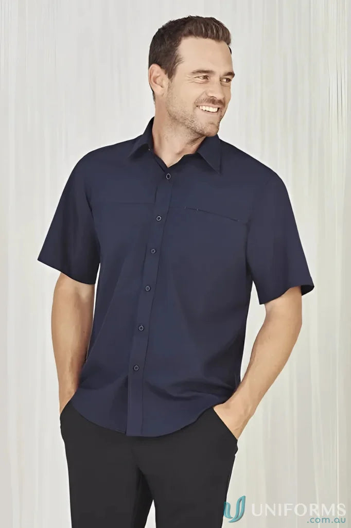 Man in navy mens Oasis Short Sleeve Shirt, perfect for casual summer looks