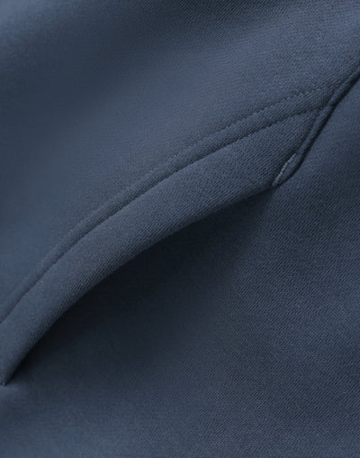 Dark blue premium oversized slate hoodie with smooth textured fabric and stitched seams perfect for work uniforms