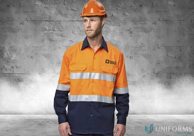 Male model wearing QE EMB+PR HiVis Cool Breeze Safety Shirt with reflective strips