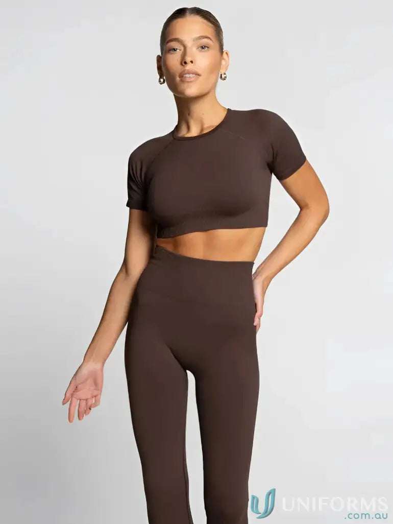 A sleek seamless cropped espresso tee and matching high-waisted leggings perfect for stylish workwear uniforms