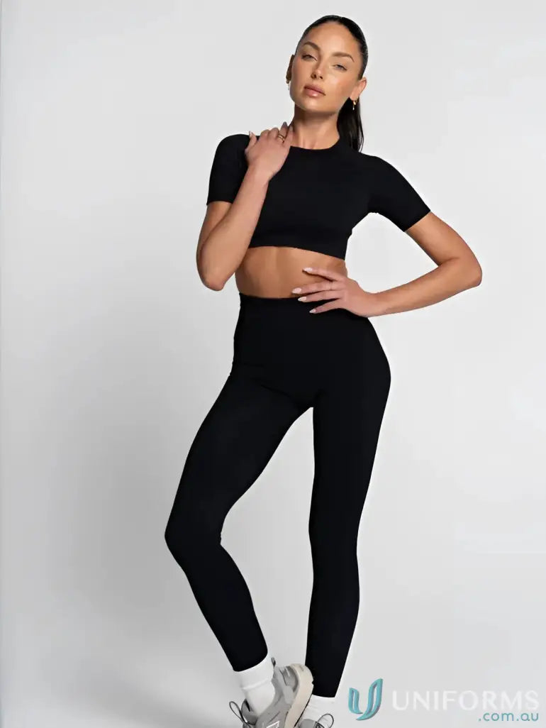 Black seamless high-waisted leggings and matching cropped tee perfect for comfortable workwear or casual work uniforms