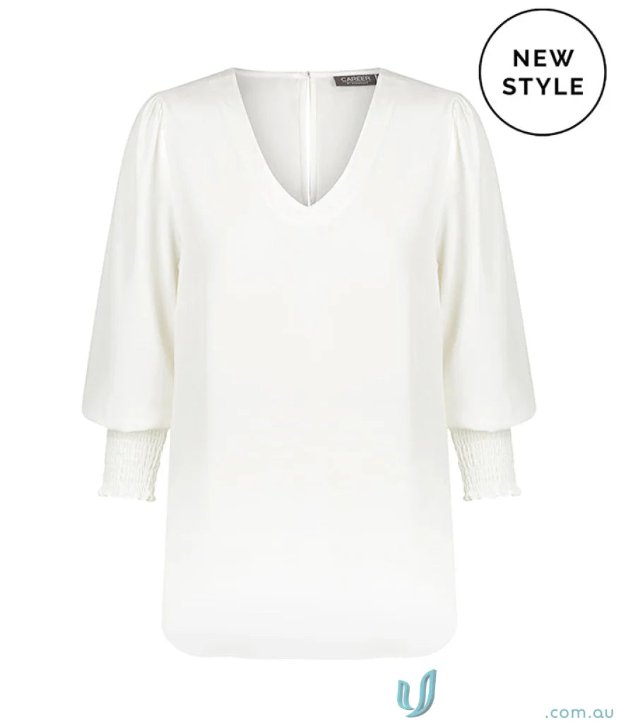 White V-neck blouse with shirred cuff sleeves, perfect for a stylish look