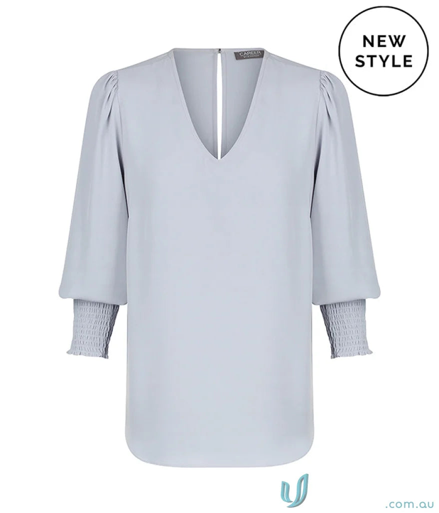 Light blue V-neck blouse with shirred cuff and neck shirred details from Shirred Cuff Top
