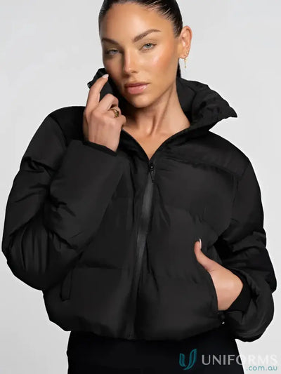 Black short puffer jacket with quilted design and high collar ideal for workwear and uniforms in cold weather