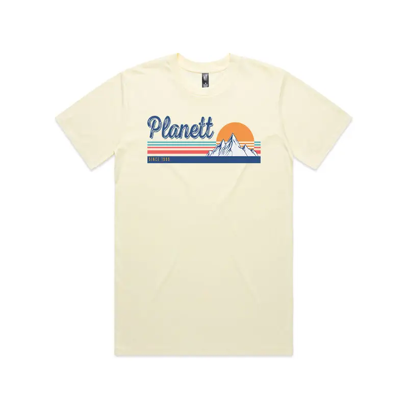 Cream-colored t-shirt with a mountain graphic.