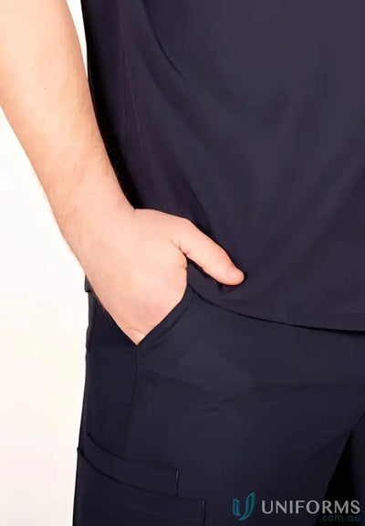 Person wearing dark blue Medi 8 Unisex Scrub Pants with hand in pocket