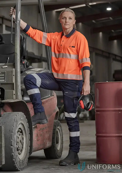 Woman in safety workwear wearing Women’s Essential Stretch Taped Cargo Pant with stretch reflective tape